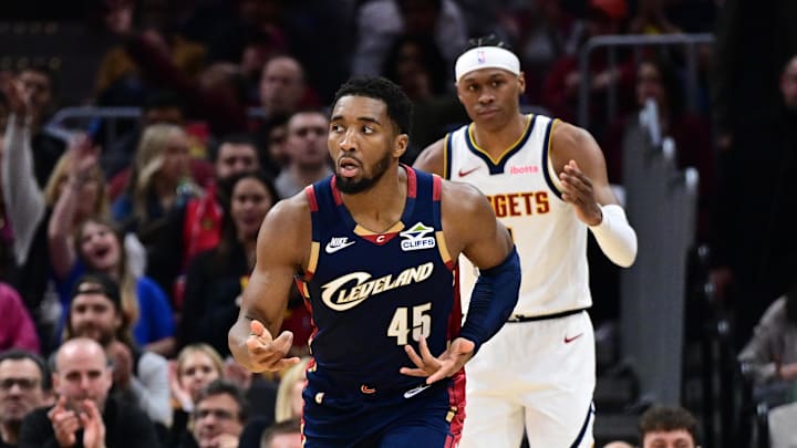 Jan 2, 2026; Cleveland, Ohio, USA; Cleveland Cavaliers guard Donovan Mitchell (45) celebrates after making a three point basket during the second half against the Denver Nuggets at Rocket Arena. Mandatory Credit: David Dermer-Imagn Images