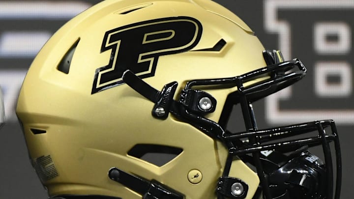 A Purdue Boilermakers helmet is displayed