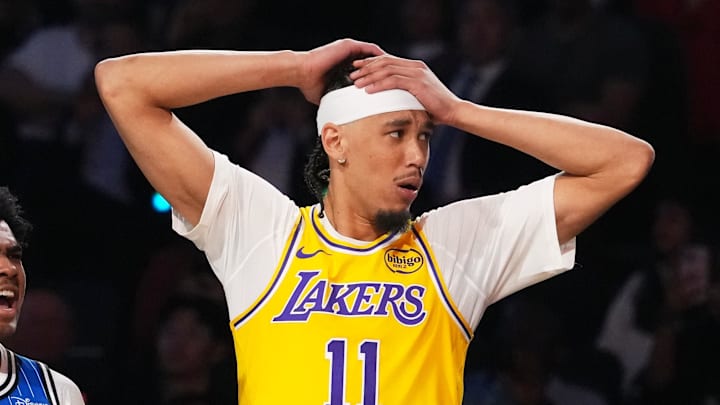 Feb 14, 2026; Los Angeles, CA, USA; Los Angeles Lakers center Jaxson Hayes (11) and Orlando Magic guard Jase Richardson (11) react during the slam dunk contest during the 2026 NBA All Star Saturday Night at Intuit Dome. Mandatory Credit: Kirby Lee-Imagn Images