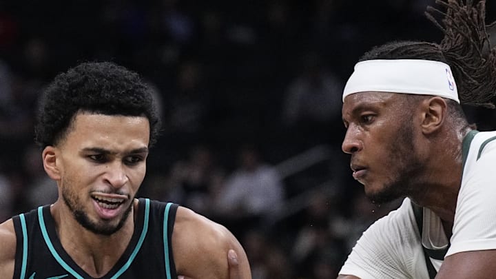 Portland Trail Blazers forward Toumani Camara drives against Milwaukee Bucks center Myles Turner. Portland Trail Blazers forward Toumani Camara drives against Milwaukee Bucks center Myles Turner.