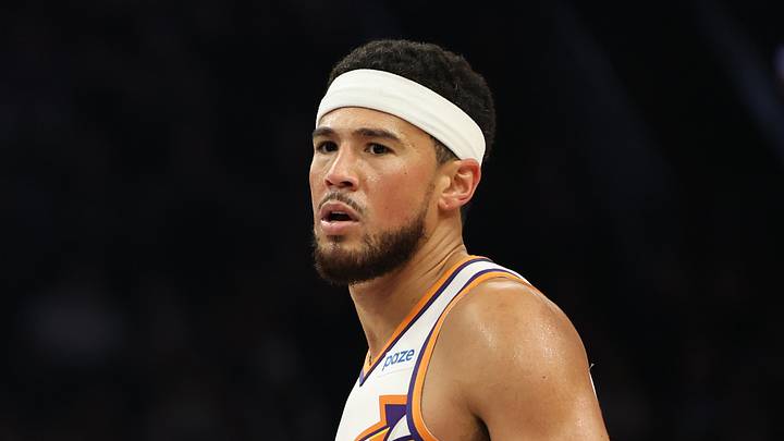 Phoenix, Arizona, USA;  Phoenix Suns guard Devin Booker (15) looks on against the Utah Jazz in the first half at Mortgage Matchup Center on Oct 16, 2026. 