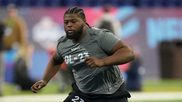 Feb 29, 2024; Indianapolis, IN, USA; Auburn defensive lineman Justin Rogers (DL23) works out during the 2024 NFL Combine at Lucas Oil Stadium.