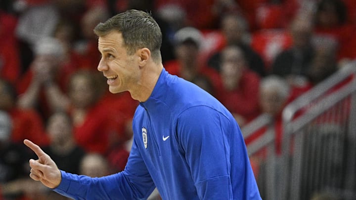 Jan 6, 2026; Louisville, Kentucky, USA; Duke Blue Devils head coach Jon Scheyer talks with Duke Blue Devils guard Isaiah Evans (3) during the first half against the Louisville Cardinals at KFC Yum! Center. Duke defeated Louisville 84-73. Mandatory Credit: Jamie Rhodes-Imagn Images Jan 6, 2026; Louisville, Kentucky, USA; Duke Blue Devils head coach Jon Scheyer talks with Duke Blue Devils guard Isaiah Evans (3) during the first half against the Louisville Cardinals at KFC Yum! Center. Duke defeated Louisville 84-73. Mandatory Credit: Jamie Rhodes-Imagn Images