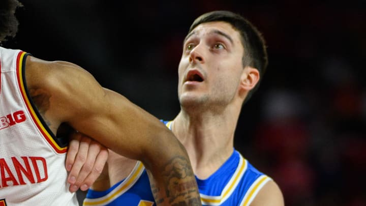 Jan 10, 2025; College Park, Maryland, USA; Maryland Terrapins forward Tafara Gapare (6) and UCLA Bruins guard Lazar Stefanovic (10) fight for position during the first half at Xfinity Center. Mandatory Credit: Reggie Hildred-Imagn Images Jan 10, 2025; College Park, Maryland, USA; Maryland Terrapins forward Tafara Gapare (6) and UCLA Bruins guard Lazar Stefanovic (10) fight for position during the first half at Xfinity Center. Mandatory Credit: Reggie Hildred-Imagn Images