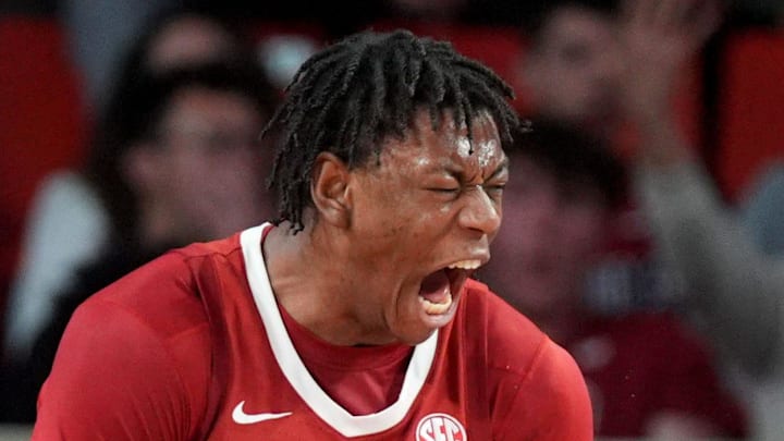 Alabama forward Aiden Sherrell (22) celebrates next to Oklahoma guard Xzayvier Brown (1) and Alabama guard Houston Mallette (95) in the second half of the men's college basketball game between the University of Oklahoma Sooners and the Alabama Crimson Tide, Saturday Jan. 17, 2026.