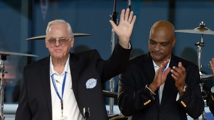 Former Oklahoma halfback Clendon Thomas receives his blazer at the College Football Hall of Fame in 2012. Former Oklahoma halfback Clendon Thomas receives his blazer at the College Football Hall of Fame in 2012.