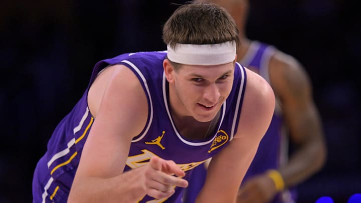 Feb 5, 2026; Los Angeles, California, USA;  Los Angeles Lakers guard Austin Reaves (15) reacts after a foul in the second half against the Philadelphia 76ers at Crypto.com Arena. Mandatory Credit: Jayne Kamin-Oncea-Imagn Images