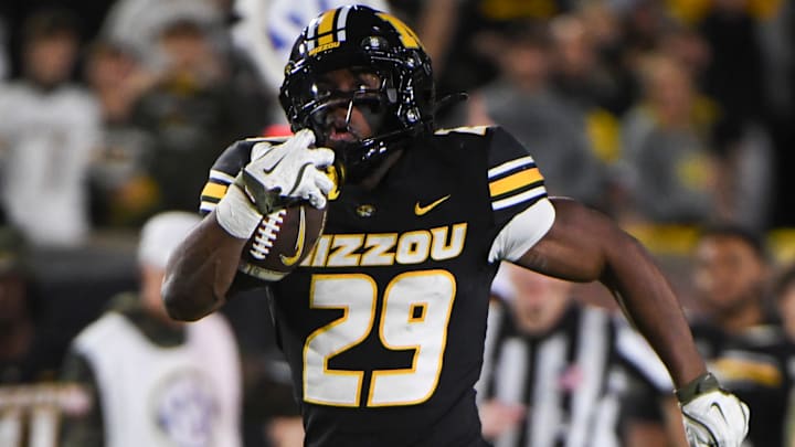 Missouri running back Ahmad Hardy (29) runs for yardage in the fourth quarter of a game against Mississippi State on Saturday