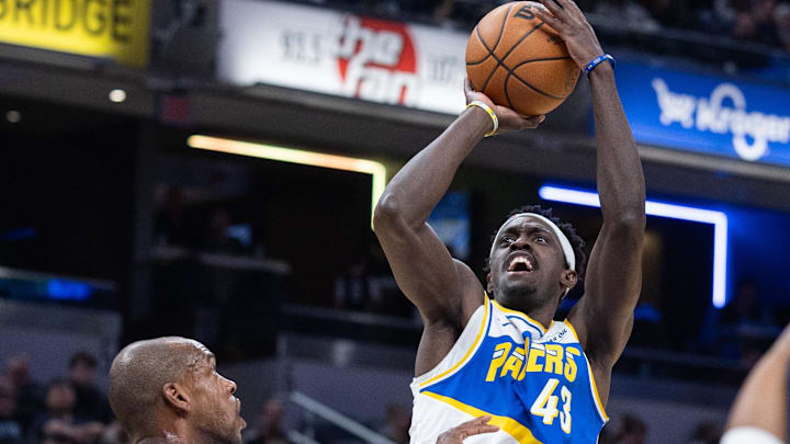 Feb 22, 2026; Indianapolis, Indiana, USA; Indiana Pacers forward Pascal Siakam (43)  shoots the ball while Dallas Mavericks forward Khris Middleton (20) defends in the first half at Gainbridge Fieldhouse. Mandatory Credit: Trevor Ruszkowski-Imagn Images