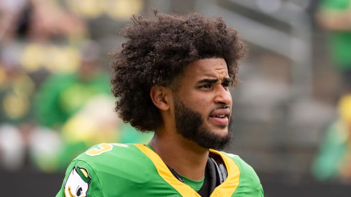 Oregon quarterback Dante Moore warms up as the Oregon Ducks host the Oklahoma State Cowboys on Sept. 6, 2025, at Autzen Stadium in Eugene, Oregon.