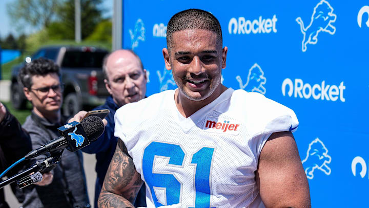 Detroit Lions defensive lineman Ahmed Hassanein (61) speaks after practice during rookie mini camp at Performance Center