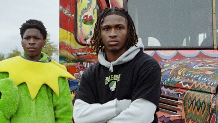 Dakorien Moore Poses for Oregon's new tie dye Nike collection.