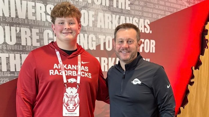Valley View junior defensive lineman Eli Thornton with Arkansas Razorbacks coach Ryan Silverfield during his unofficial visit Monday, March 2. 