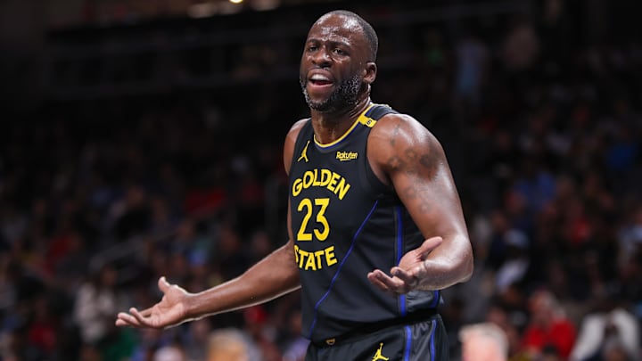 Mar 22, 2025; Atlanta, Georgia, USA; Golden State Warriors forward Draymond Green (23) argues a call against the Atlanta Hawks in the first quarter at State Farm Arena.