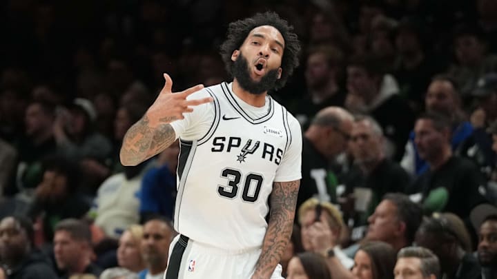 May 8, 2026; Minneapolis, Minnesota, USA; San Antonio Spurs forward Julian Champagnie (30) celebrates making a three point shot against the Minnesota Timberwolves in the second half during game three of the second round of the 2026 NBA Playoffs at Target Center. Mandatory Credit: Jesse Johnson-Imagn Images
