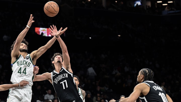Apr 7, 2026; Brooklyn, New York, USA; Milwaukee Bucks guard Andre Jackson Jr. (44) and Brooklyn Nets guard Ben Saraf (77) compete for a rebound during the second half at Barclays Center. Mandatory Credit: John Jones-Imagn Images Apr 7, 2026; Brooklyn, New York, USA; Milwaukee Bucks guard Andre Jackson Jr. (44) and Brooklyn Nets guard Ben Saraf (77) compete for a rebound during the second half at Barclays Center. Mandatory Credit: John Jones-Imagn Images