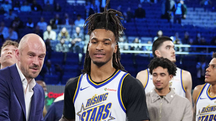 February 14, 2025; San Francisco, California, USA; Team C guard Stephon Castle (5) of the San Antonio Spurs holds the trophy during the 2025 NBA Rising Stars Game at Chase Center. Mandatory Credit: Kyle Terada-Imagn Images