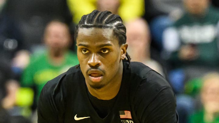 Jan 20, 2026; Eugene, Oregon, USA; Michigan State Spartans forward Coen Carr (55) brings the ball up court during the second half against the Oregon Ducks at Matthew Knight Arena.