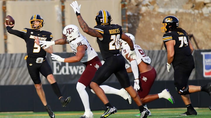 Nov 8, 2025; Columbia, Missouri, USA; Missouri Tigers quarterback Matt Zollers throws the ball in the Missouri matchup against Texas A&M at Faurot Field.