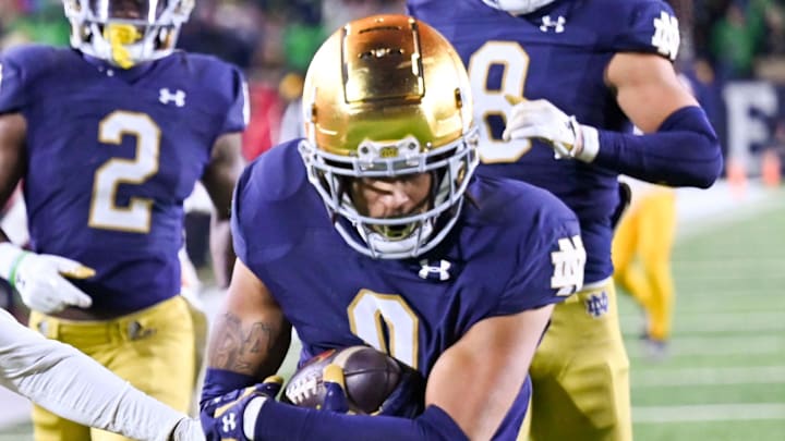 Oct 14, 2023; South Bend, Indiana, USA; Notre Dame Fighting Irish safety Xavier Watts (0) scores a