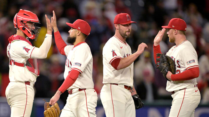 Apr 8, 2024; Anaheim, California, USA; Los Angeles Angels designated hitter Miguel Sano (22), third baseman Luis Rengifo (2), catcher Logan O'Hoppe (14), third baseman Anthony Rendon (6), pitcher Hunter Strickland (61), and second baseman Brandon Drury (23) leave the field after the final out of the ninth inning defeating the Tampa Bay Rays at Angel Stadium. Mandatory Credit: Jayne Kamin-Oncea-USA TODAY Sports Apr 8, 2024; Anaheim, California, USA; Los Angeles Angels designated hitter Miguel Sano (22), third baseman Luis Rengifo (2), catcher Logan O'Hoppe (14), third baseman Anthony Rendon (6), pitcher Hunter Strickland (61), and second baseman Brandon Drury (23) leave the field after the final out of the ninth inning defeating the Tampa Bay Rays at Angel Stadium. Mandatory Credit: Jayne Kamin-Oncea-USA TODAY Sports