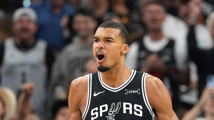 May 12, 2026; San Antonio, Texas, USA; San Antonio Spurs forward Victor Wembanyama and guard Devin Vassell (24) react during the first half of game five of the second round of the 2026 NBA Playoffs against the Minnesota Timberwolves at Frost Bank Center. Mandatory Credit: Scott Wachter-Imagn Images