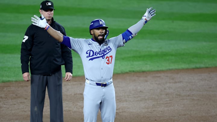 Oct 30, 2024; New York, New York, USA; Los Angeles Dodgers outfielder Teoscar Hernandez (37) celebrates after hitting a two-RBI double during the fifth inning against the New York Yankees in game five of the 2024 MLB World Series at Yankee Stadium. Mandatory Credit: Wendell Cruz-Imagn Images