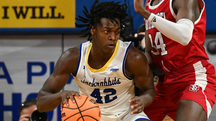 SDSU forward William Kyle III (42) drives the ball on Sunday, Feb. 4, 2024 at Frost Arena in Brookings.