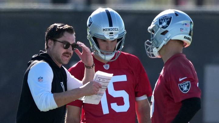 Jun 9, 2026; Henderson, NV, USA; Las Vegas Raiders offensive coordinator Andrew Janocko (left) talks with quarterbacks Fernando Mendoza (15) and Kirk Cousins (8) during minicamp at Intermountain Health Performance Center. Mandatory Credit: Kirby Lee-Imagn Images Jun 9, 2026; Henderson, NV, USA; Las Vegas Raiders offensive coordinator Andrew Janocko (left) talks with quarterbacks Fernando Mendoza (15) and Kirk Cousins (8) during minicamp at Intermountain Health Performance Center. Mandatory Credit: Kirby Lee-Imagn Images