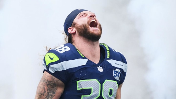 Dec 14, 2025; Seattle, Washington, USA; Seattle Seahawks fullback Brady Russell (38) exits the tunnel during player introductions before a game against the Los Angeles Chargers at Lumen Field. Mandatory Credit: Kevin Ng-Imagn Images
