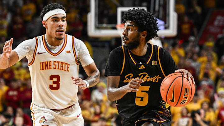 Mar 7, 2026; Ames, Iowa, USA; Arizona State Sun Devils guard Maurice Odum (5) is defended by Iowa State Cyclones guard Tamin Lipsey (3) during the second half at James H. Hilton Coliseum. Mandatory Credit: Jeffrey Becker-Imagn Images