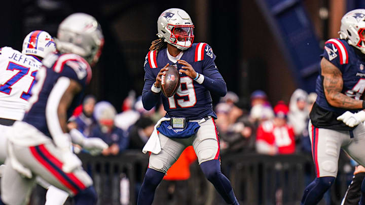 Jan 5, 2025; Foxborough, Massachusetts, USA; New England Patriots quarterback Joe Milton III (19) throws a pass against the Buffalo Bills in the first half at Gillette Stadium. Mandatory Credit: David Butler II-Imagn Images