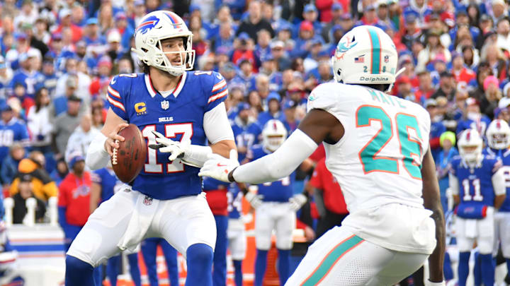 Buffalo Bills quarterback Josh Allen (17) and former Miami Dolphins safety Marcus Maye (26).