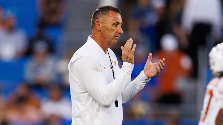 Texas Longhorns head coach Steve Sarkisian claps during warmups before the game against the Kentucky Wildcats.