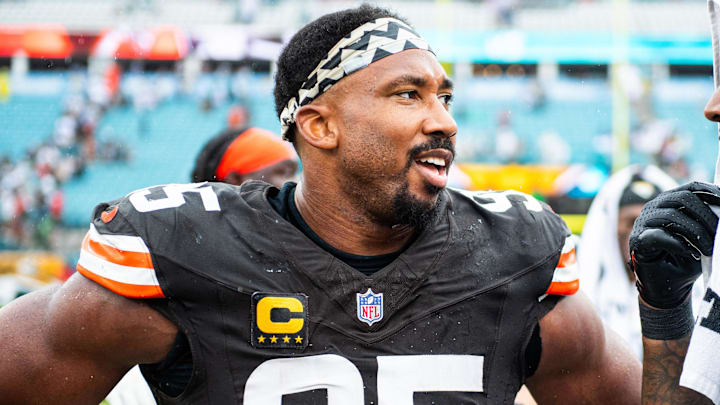 Sep 15, 2024; Jacksonville, Florida, USA; Cleveland Browns defensive end Myles Garrett (95) talks with Jacksonville Jaguars defensive end Josh Hines-Allen (41) after a game at EverBank Stadium. Mandatory Credit: Jeremy Reper-Imagn Images