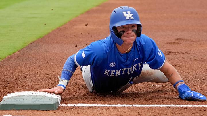 May 20, 2025; Hoover, AL, USA; Kentucky second baseman Luke Lawrence (10) dives back to first on a pickoff attempt during the game with Oklahoma in the first round of the SEC Baseball Tournament at the Hoover Met.