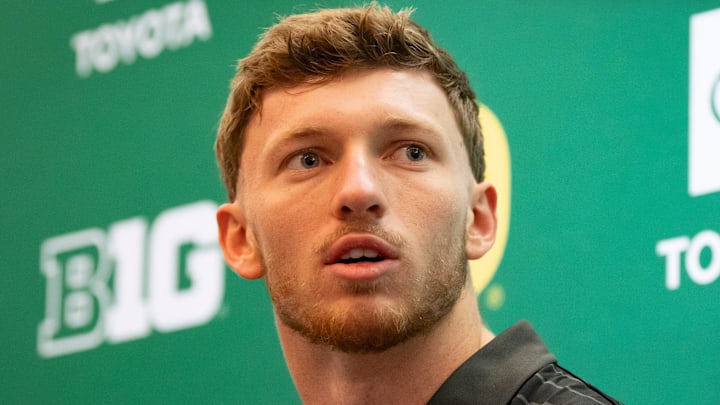 Oregon defensive back Dillon Thieneman speaks with reporters during Oregon football’s Media Day on July 28, 2025, at Autzen Stadium in Eugene.