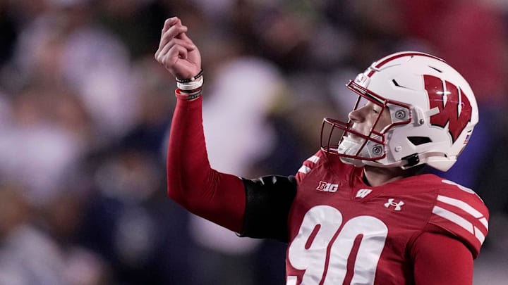 Wisconsin Badgers kicker Nathanial Vakos (90) is making life hard on opposing offenses due to his booming leg on kickoffs that guarantees a touchback every time.