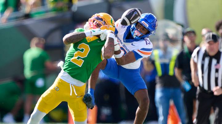 Sep 5, 2026; Eugene, Oregon, USA; Oregon Ducks defensive back Na'eem Offord (2) breaks up a pass play during the second half against Boise State Broncos wide receiver Darren Morris (13) at Autzen Stadium. Mandatory Credit: Troy Wayrynen-Imagn Images
