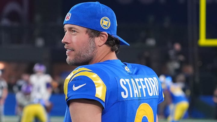 Jan 13, 2025; Glendale, AZ, USA; Los Angeles Rams quarterback Matthew Stafford (9) and wide receiver Cooper Kupp (10) watch from the sidelines against the Minnesota Vikings during the second half in an NFC wild card game at State Farm Stadium. Mandatory Credit: Joe Camporeale-Imagn Images