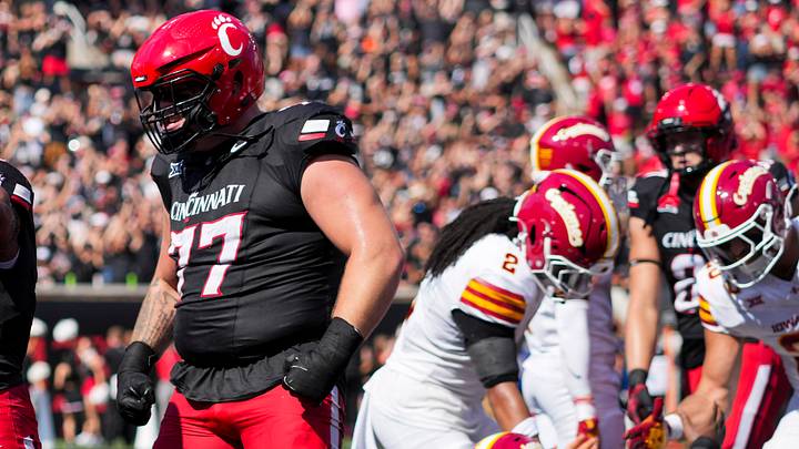 Oct 4, 2025; Cincinnati, Ohio, USA; Cincinnati Bearcats running back Evan Pryor (6) celebrates scoring a touchdown with offensive lineman Taran Tyo (77) in the game against the Iowa State Cyclones in the first half at Nippert Stadium. Mandatory Credit: Aaron Doster-Imagn Images Oct 4, 2025; Cincinnati, Ohio, USA; Cincinnati Bearcats running back Evan Pryor (6) celebrates scoring a touchdown with offensive lineman Taran Tyo (77) in the game against the Iowa State Cyclones in the first half at Nippert Stadium. Mandatory Credit: Aaron Doster-Imagn Images