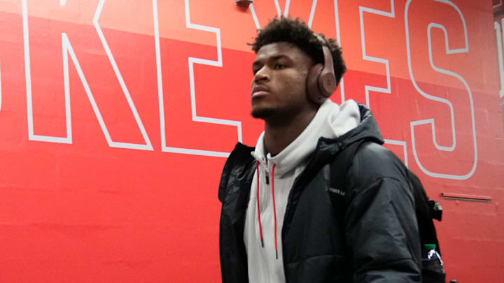 Ohio State Buckeyes defensive back Caleb Downs (2) arrives prior to the Big Ten Conference championship game against the Indiana Hoosiers at Lucas Oil Stadium in Indianapolis on Dec. 6, 2025.