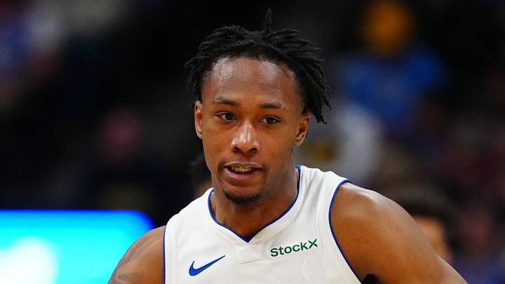 Dec 28, 2024; Denver, Colorado, USA; Detroit Pistons forward Ronald Holland II (00) dribbles up court in the second half against the Denver Nuggets at Ball Arena. Mandatory Credit: Ron Chenoy-Imagn Images