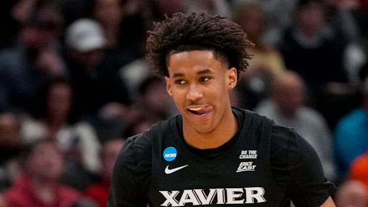 Xavier Musketeers guard Dailyn Swain (3) smiles after sinking a three pointer in the first half of the NCAA Tournament First Round game between the Illinois Fighting Illini and the Xavier Musketeers at Fiserv Forum in Milwaukee on Friday, March 21, 2025. Xavier was eliminated from the tournament, losing 86-73, to Illinois.
