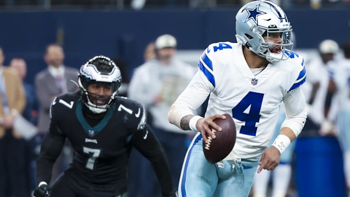 Dec 24, 2022; Arlington, Texas, USA;  Dallas Cowboys quarterback Dak Prescott (4) looks to pass as