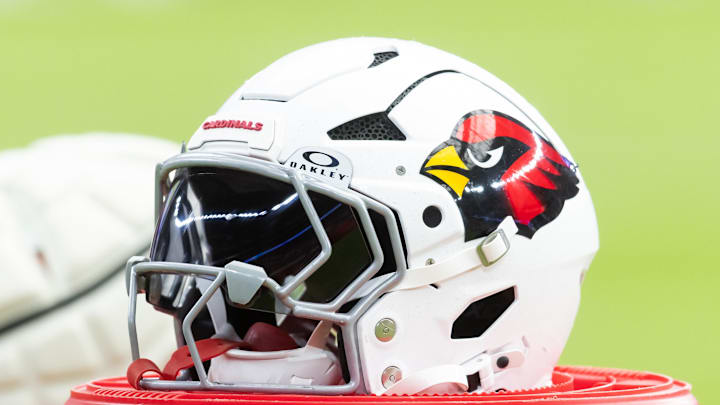 Aug 2, 2025; Glendale, AZ, USA; Detailed view of an Arizona Cardinals helmet during the Red and White practice in training camp at State Farm Stadium. Mandatory Credit: Mark J. Rebilas-Imagn Images