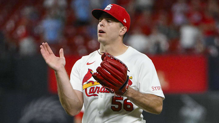 Jul 24, 2025; St. Louis, Missouri, USA;  St. Louis Cardinals relief pitcher Ryan Helsley (56) celebrates after the Cardinals defeated the San Diego Padres at Busch Stadium. 