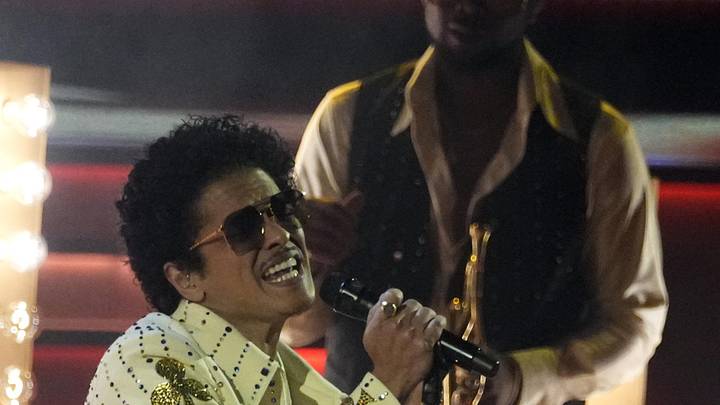 Apr 3, 2022; Las Vegas, NV, USA;   Bruno Mars from Silk Sonic performs    777    during the 64th Annual Grammy Awards at the MGM Grand Garden Arena in Las Vegas. Mandatory Credit: Robert Hanashiro-USA TODAY