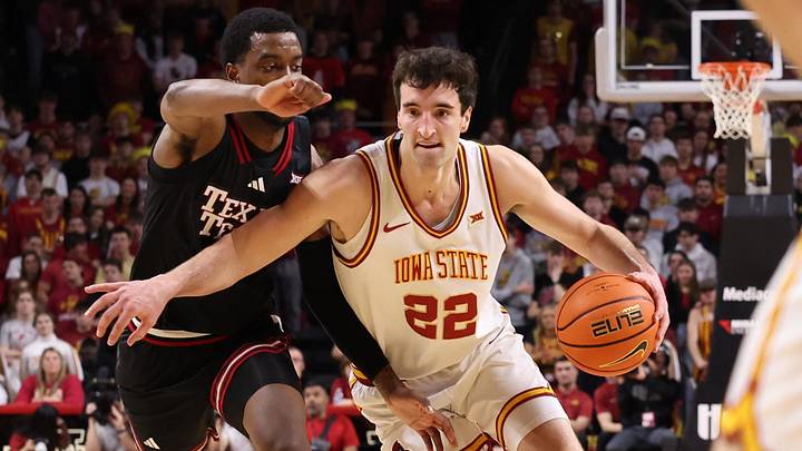 Feb 28, 2026; Ames, Iowa, USA; Texas Tech Red Raiders forward Donovan Atwell (12) defends Iowa State Cyclones forward Milan Momcilovic (22) during the first half at James H. Hilton Coliseum. Mandatory Credit: Reese Strickland-Imagn Images Feb 28, 2026; Ames, Iowa, USA; Texas Tech Red Raiders forward Donovan Atwell (12) defends Iowa State Cyclones forward Milan Momcilovic (22) during the first half at James H. Hilton Coliseum. Mandatory Credit: Reese Strickland-Imagn Images