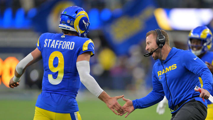 Jan 4, 2026; Inglewood, California, USA;  Los Angeles Rams head coach Sean McVay reacts with quarterback Matthew Stafford (9) after a touchdown against the Arizona Cardinals during the second half at SoFi Stadium. Mandatory Credit: Jayne Kamin-Oncea-Imagn Images